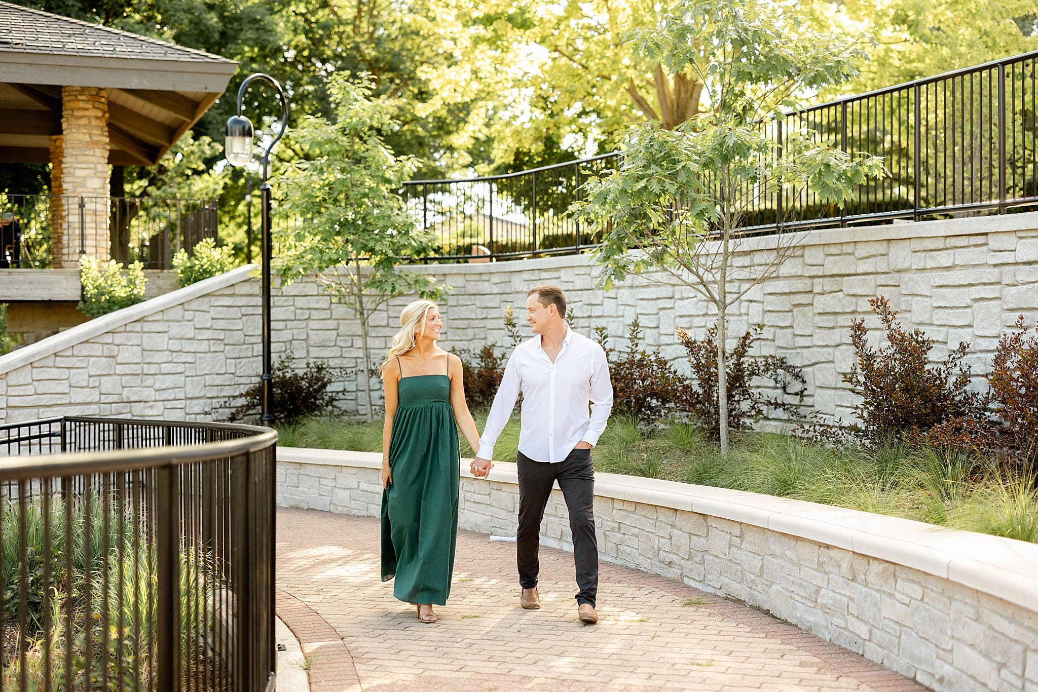 Featuring Danielle & Joey's summer Naperville Riverwalk engagement photos with Chicagoland wedding photographer Jillian Photography.